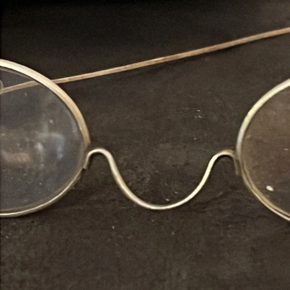 Antique metal wire rimmed eyeglasses and case